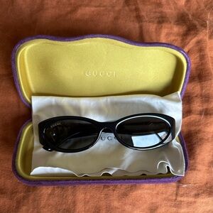 GUCCI black oval frame sunglasses